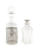 A Group of Two Sterling Silver and Cut Glass Decanters