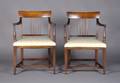 A Pair of Regency Style Arm Chairs