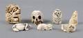 A Group of Seven Asian Ivory and Bone Netsuke and Toggles
