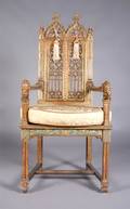 A Gothic Style Painted and Parcel Gilt Armchair