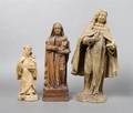A Group of Three Continental Carved Wood Figures