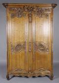A French Carved Oak Wedding Armoire