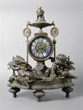A French Cast Metal Figural Clock