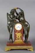 A French Gilt and Patinated Bronze Figural Clock Lesieur