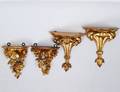TWO PAIRS OF CARVED AND GILTWOOD BRACKETS
