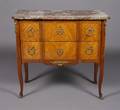 A Louis XVI Style Parquetry Chest of Drawers