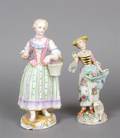 A Group of Two Enameled Porcelain Figures