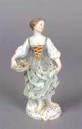 A German Porcelain Figure of a Woman Meissen