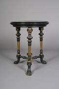 A Renaissance Revival Ebonized Center Table