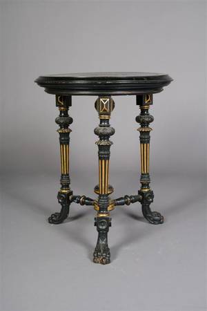 A Renaissance Revival Ebonized Center Table