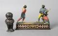 An Cast Iron Mechanical Bank Dark Town Battery