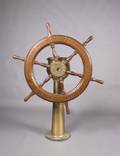 An American Brass and Wood Ships Wheel on Pedestal Dake Engineering Co