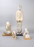 A Group of Four Chinese Pottery Tomb Figures