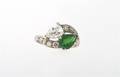 An 18 Karat White Gold Tsavorite Garnet and Diamond Ring