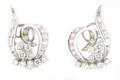 A Pair of 14 Karat White Gold and Diamond Earrings