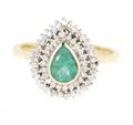 A 18 Karat Yellow and White Gold Diamond and Emerald Ring