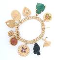 A 14 Karat Yellow Gold Charm Bracelet