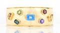 An 18 Karat Gold and Multicolor Gemstone Cuff Bracelet