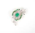 A Platinum 18 Karat Yellow Gold Diamond and Emerald Brooch
