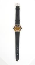 An 18 Karat White Gold and Tigers Eye Wristwatch Piaget