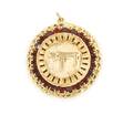 A 14 Karat Yellow Gold and Garnet Pendant