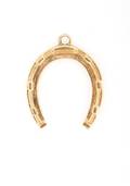 An 18 Karat Yellow Gold Bracelet and 14 Karat Yellow Gold Horseshoe Charm