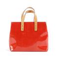 A Louis Vuitton Monogram Red Patent Leather Tote