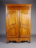 A French Provincial Walnut Armoire