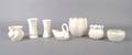 A Collection of Seven Belleek Vases