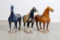 A Group of Three Painted Tang Style Horses