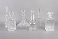A Group of Six Glass and Crystal Decanters