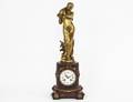 EMPIRE STYLE GILT BRONZE AND ROUGE MARBLE MANTEL CLOCK