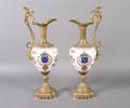 A Pair of Porcelain Metal Mounted Ewers