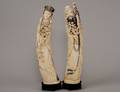 PAIR OF CARVED IVORY FIGURES OF TWO DEITIES