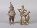 Two Cast Iron Figural Still Banks