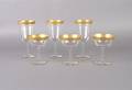 A Set of GoldRimmed Stemware