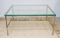 A Gilt Metal and Glass Low Table