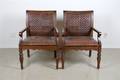 A Pair of Woven Leather Armchairs