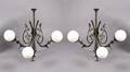 A Pair of Cast Iron ThreeLight Sconces