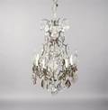 A Cast Metal and Glass EightLight Chandelier