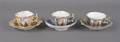A Group of Three German Porcelain Demitasse Cups and Saucers