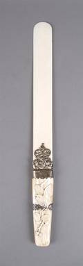 A Carved Ivory and Silver Page Turner