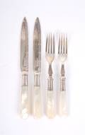 A MotherofPearl Handled Silver Fruit Set