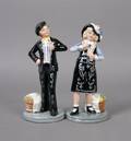 A Group of Two Royal Doulton Porcelain Figures