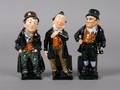 A Group of Three Royal Doulton Miniature Porcelain Figures