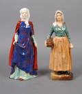 A Group of Two Royal Doulton Porcelain Figures