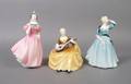 A Group of Three Royal Doulton Porcelain Figures