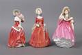 A Group of Three Royal Doulton Porcelain Figures