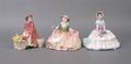 A Group of Royal Doulton Porcelain Figures