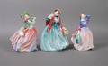 A Group of Three Royal Doulton Porcelain Figures